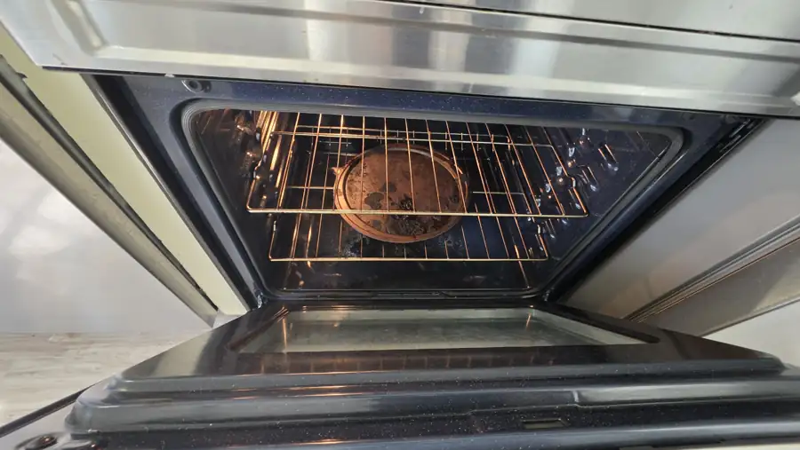Oven interior checked for condition and cleanliness
